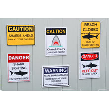Load image into Gallery viewer, Decorate your Jaws Party with these fun shark decorative signs. You will receive a PDF file formatted 8 ½ X 11inches with 8 different Shark Warning Signs. Two of the signs can be edited with your child's name. 