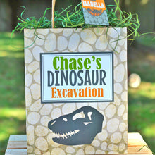 Load image into Gallery viewer, Personalized Favor Bags to fill up with goodies and treats for your Dinosaur Party. These bags come in two sizes and include personalized tags to add your guest names or child name.