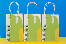 Load image into Gallery viewer, Chomp! Chomp! There's a party in the swamp! Use this template to decorate the favor bags for your Alligator birthday party. This PDF file also includes editable tags, to add the names of your guests or your child's name.